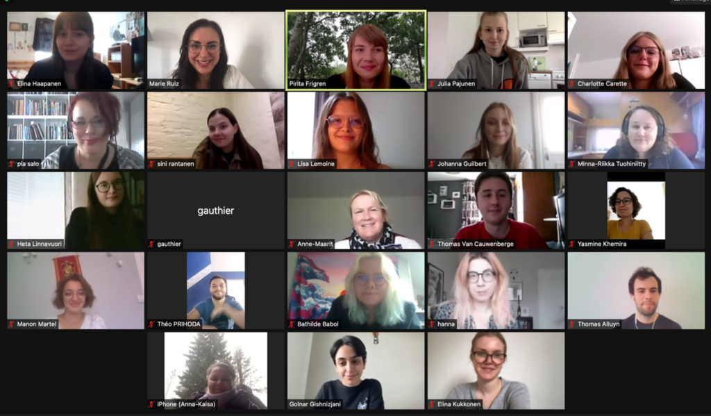 Screen grab from a Zoom call with 23 women looking at the camera