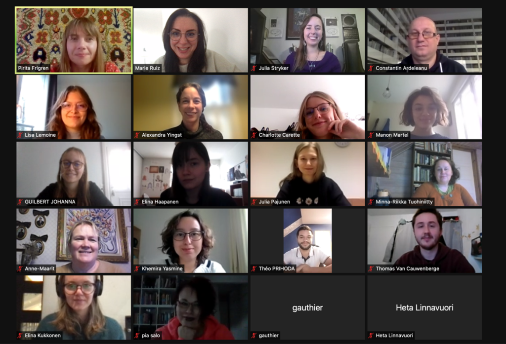 Screen grab from a Zoom call with 18 people looking at the camera
