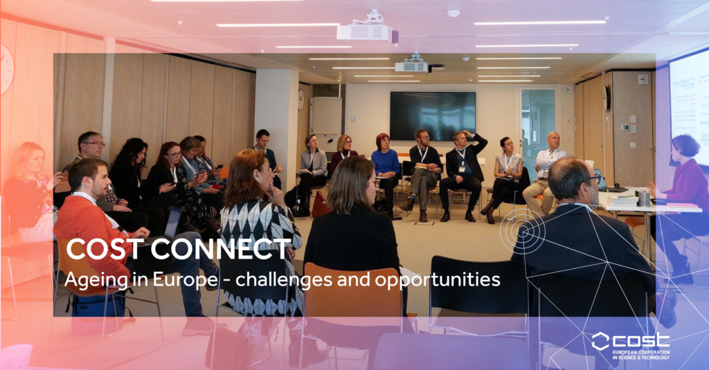 Photo of 20+ workshop participants sat in a large circle during a discussion with the text overlaid "COST Connect | Ageing in Europe - challenges and opportunities"