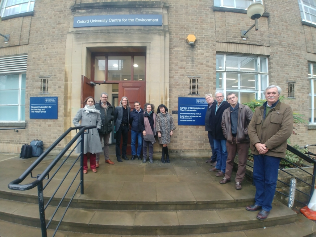 photo of a group of 10 people in front of the Oxford University Centre for the Environment 