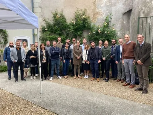 Group of 30+ researchers and innovators in the field of inflammatory diseases posing for a group photo at a COST Action workshop