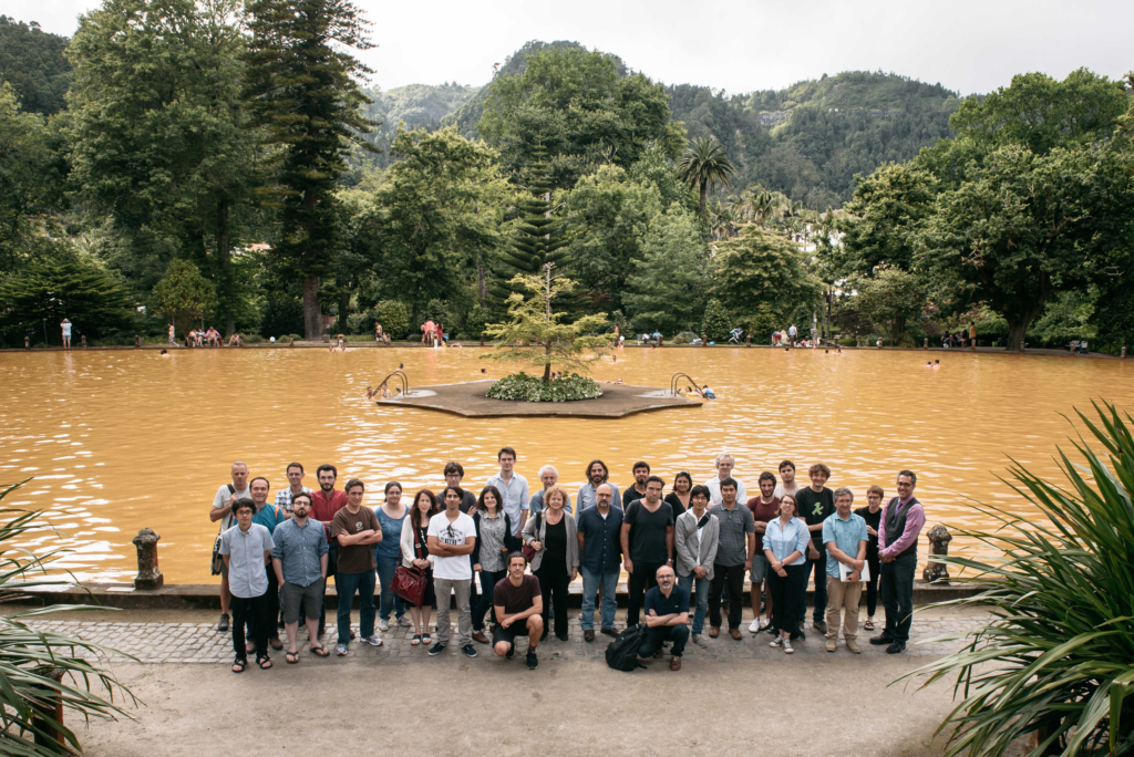 Group photo in front of a lake - GWniverse meeting in Azores