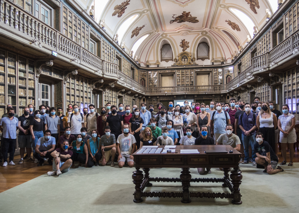 Big group photo in an old library  - GWniverse Action meeting in Lisbon